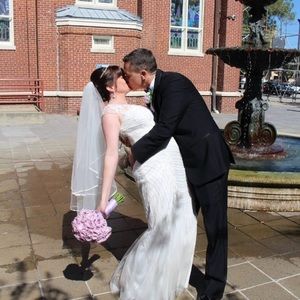 Size 10 white wedding gown. Has not been altered.